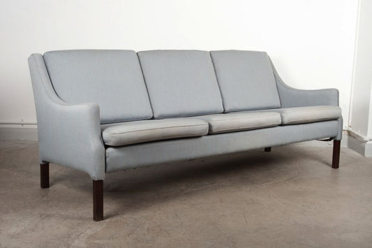 Three seat pale blue wool sofa