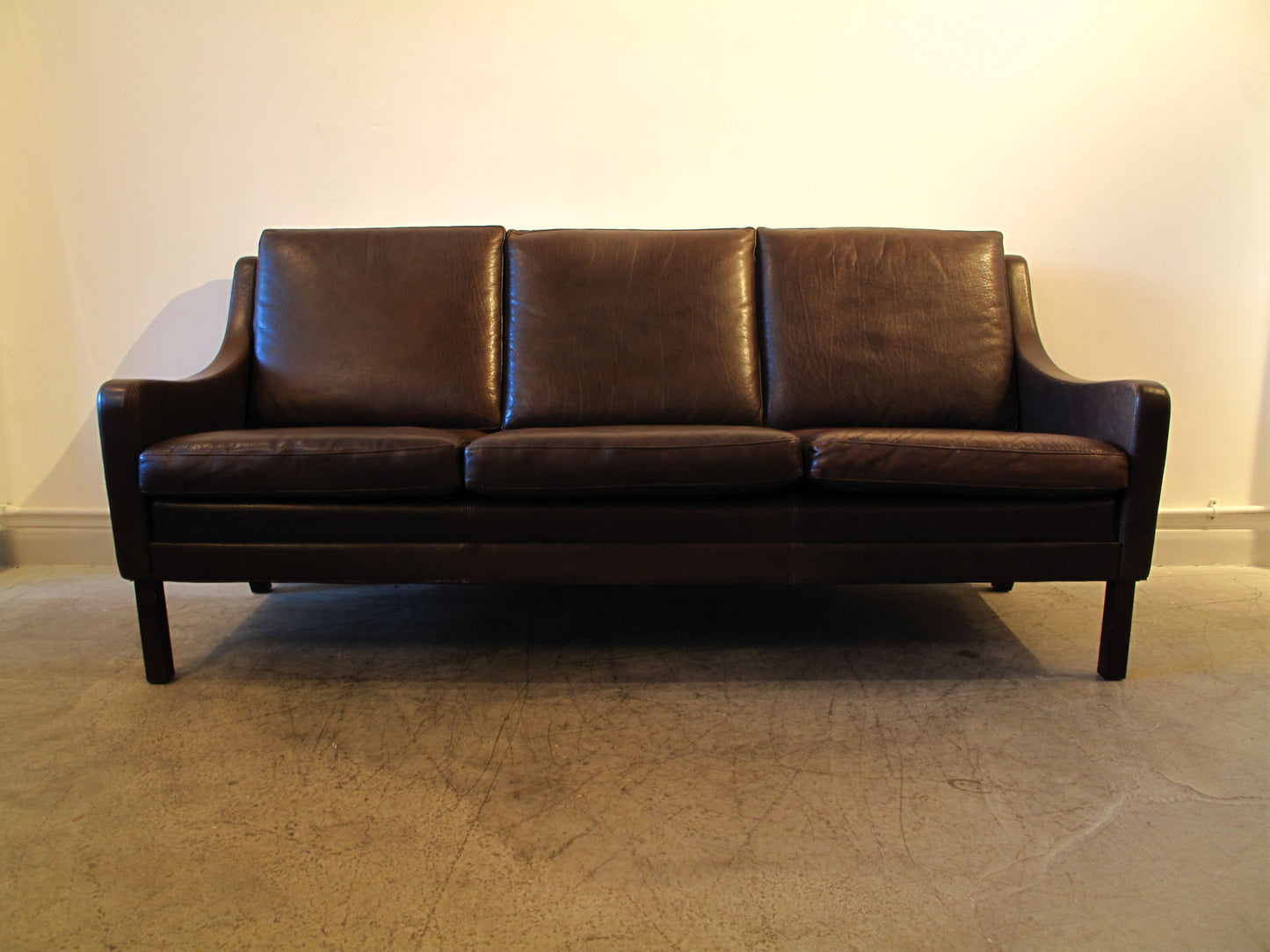 Three seat sofa in chocolate brown leather