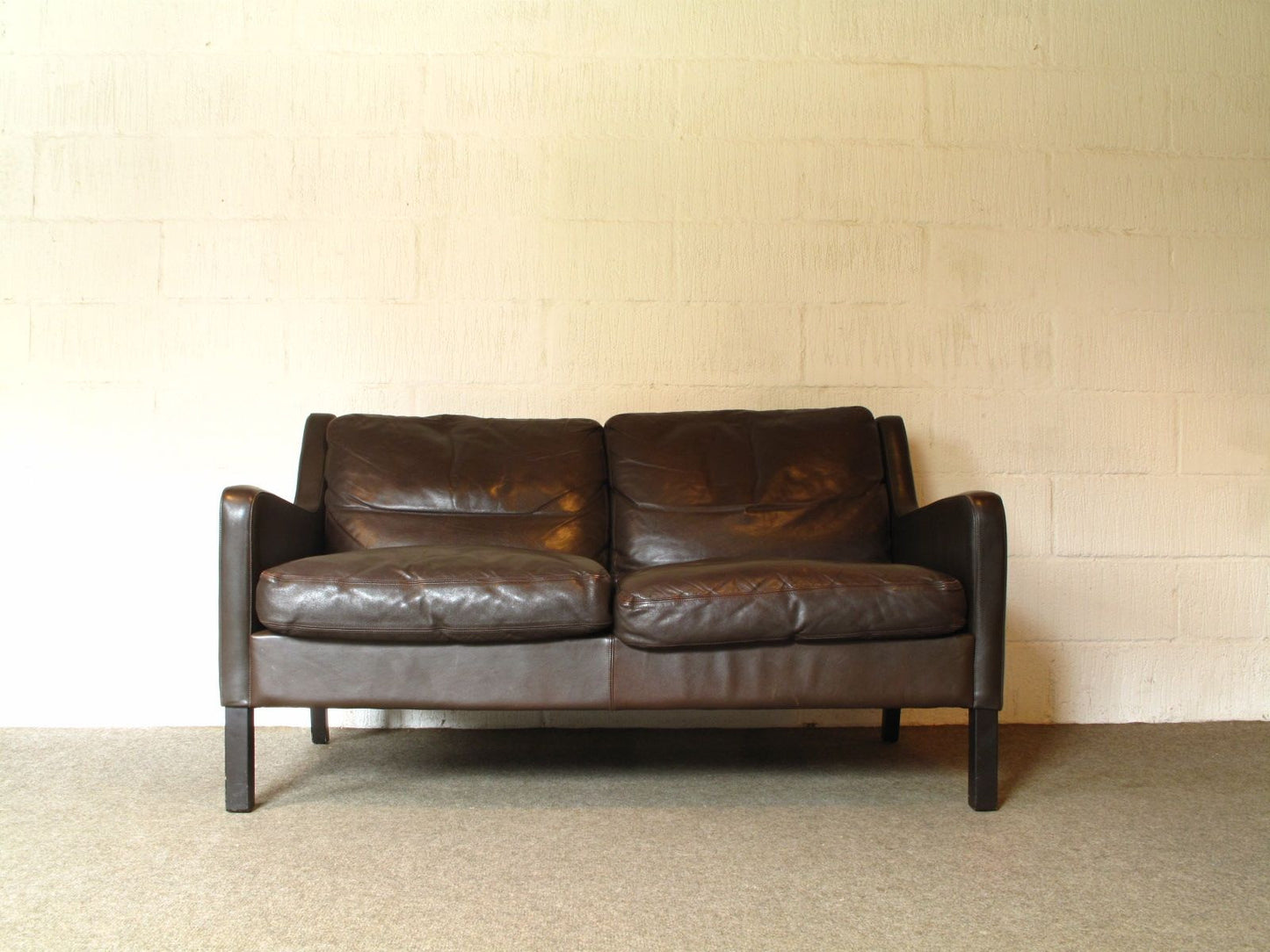 Two seat leather sofa by G. Thams