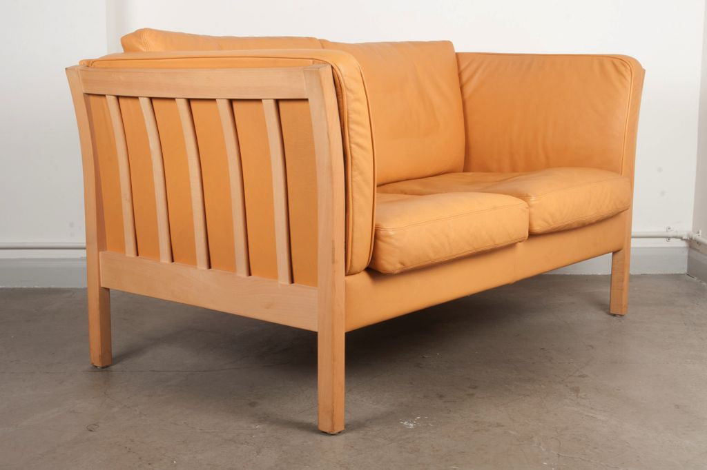Tan leather two seater by Stouby