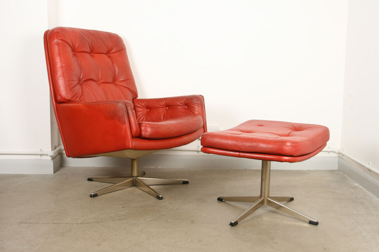 High back leather lounger with matching foot stool