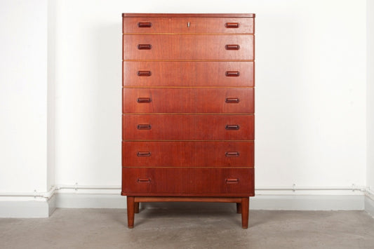 Teak chest of seven drawers