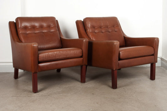 Pair of leather club chairs