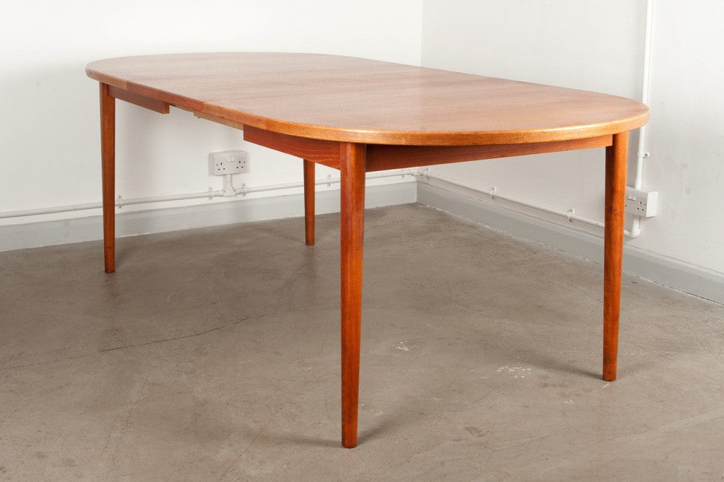 Oval shaped teak dining table by Nils Jonsson