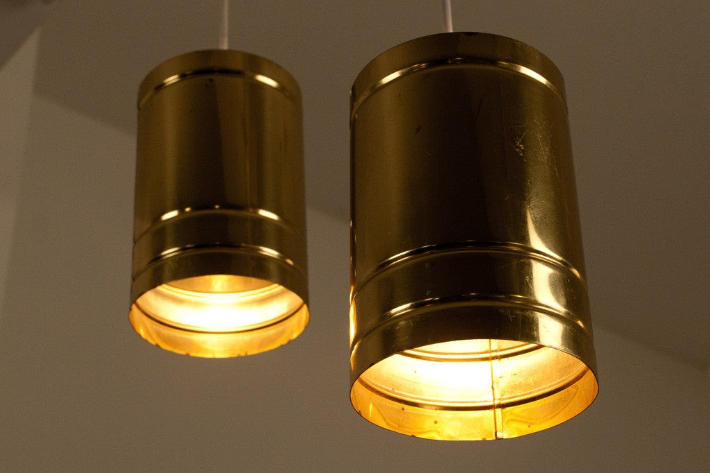 Pair of brass can lamps by David Lampe