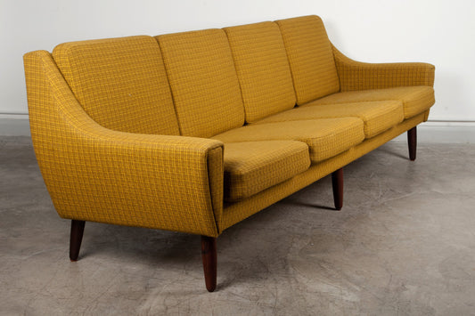 Four seat wool sofa on rosewood legs