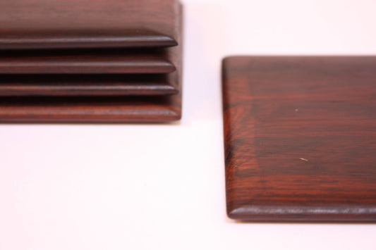 Set of six rosewood coasters