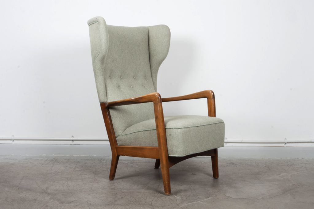 Wing back lounge chair with beech arms
