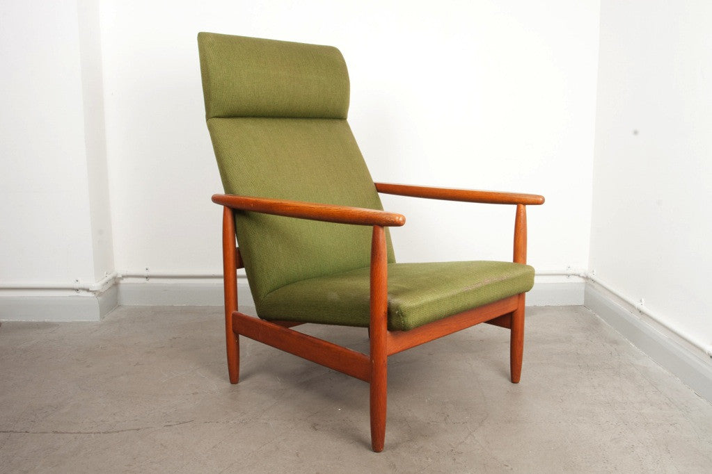 High back lounge chair by Ejvind A. Johansson