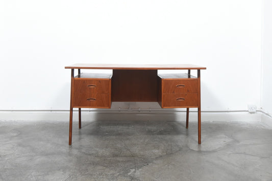 Double sided teak desk