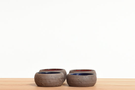 Set of four ceramic ramekins