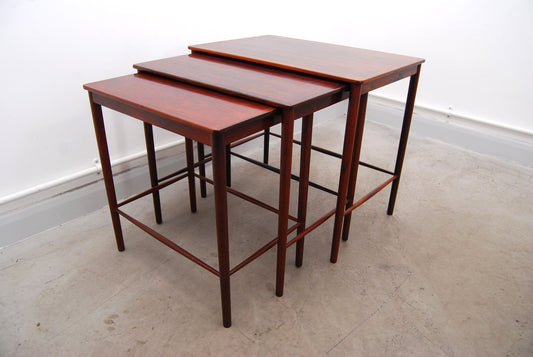 Nest of rosewood tables designed by Kai Winding