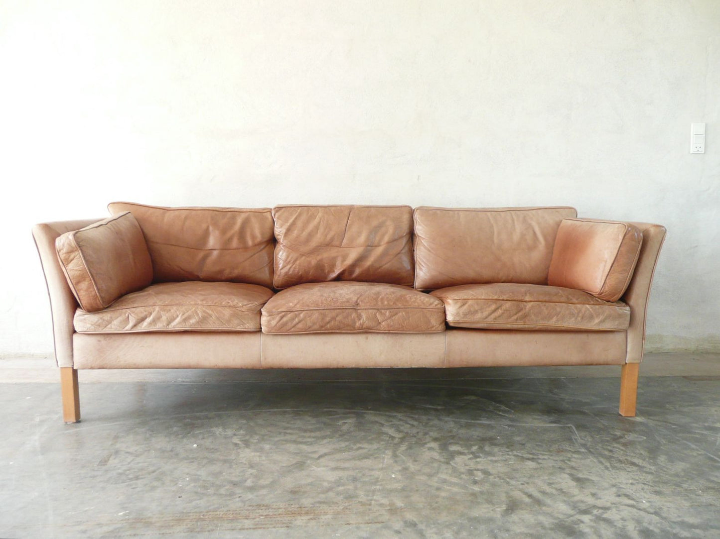 Tanned leather three seat sofa