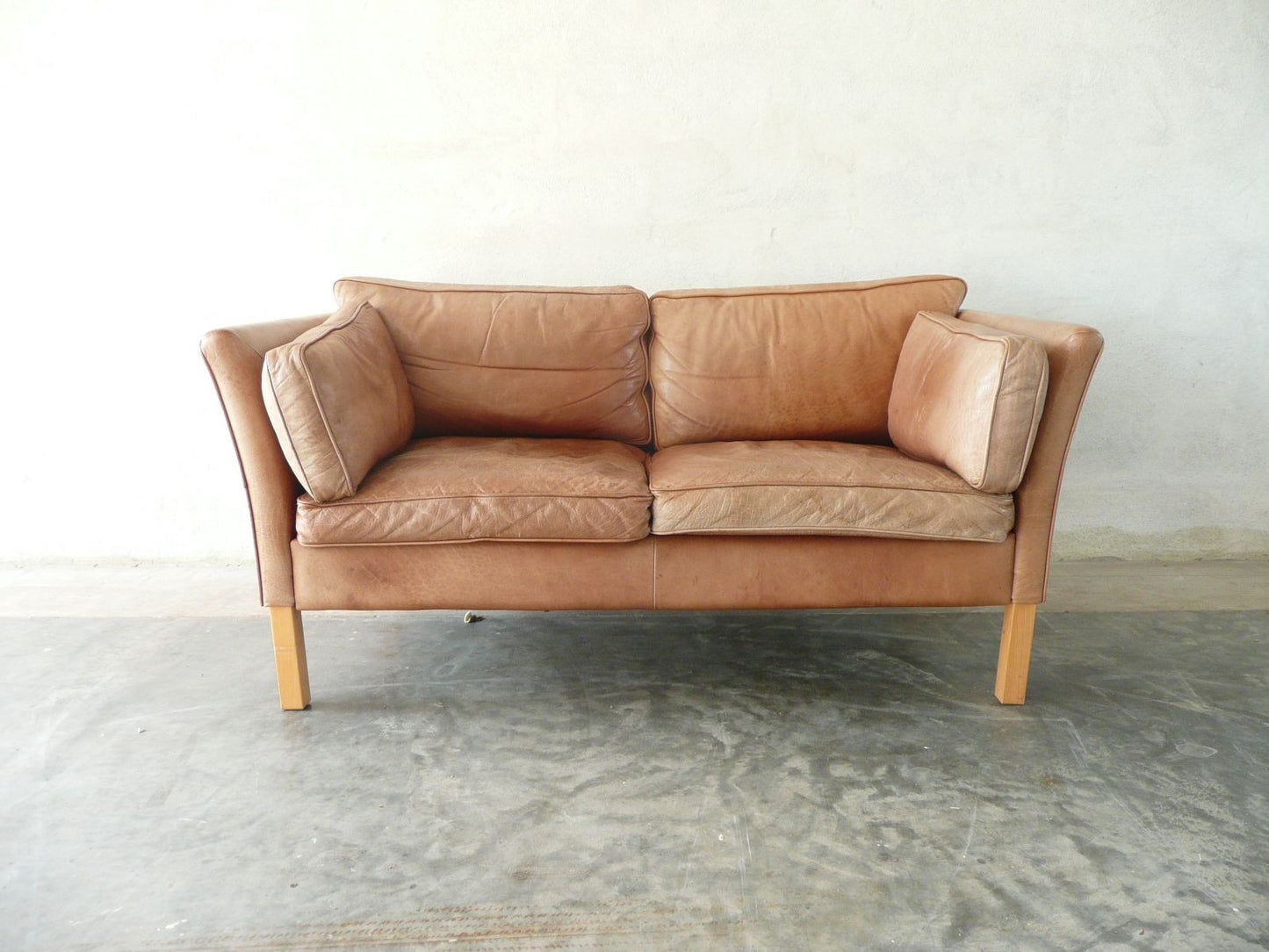 Tanned leather two seat sofa