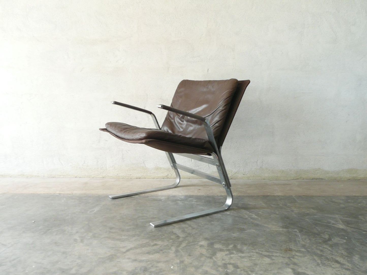 Chromed steel and leather occasional chair