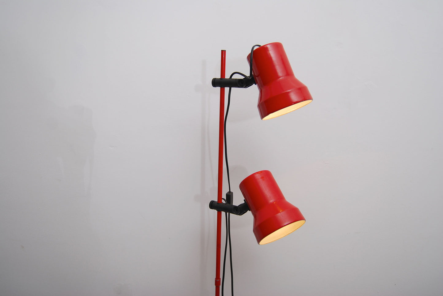 Red two headed floor lamp