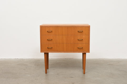 Low oak chest with brass handles