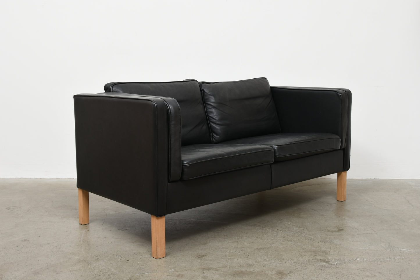 Vintage Danish leather two seat sofa