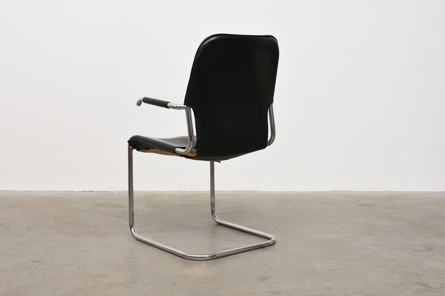 1980s leather + steel chair by Kenneth Bergenblad