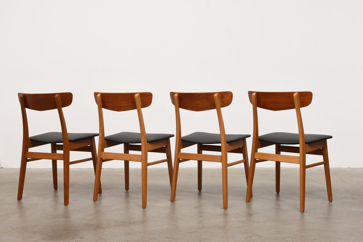Set of four teak + beech dining chairs by Farstrup