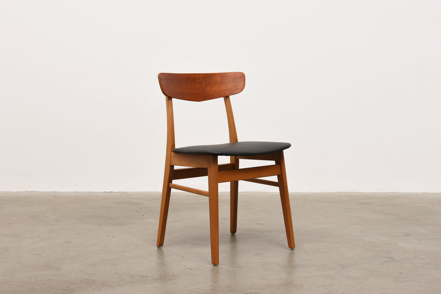 Set of four teak + beech dining chairs by Farstrup