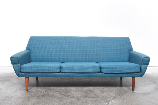 Three seat sofa in wool