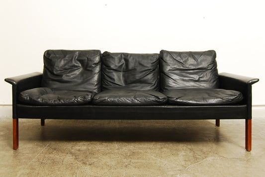 Three seat leather sofa by Hans Olsen