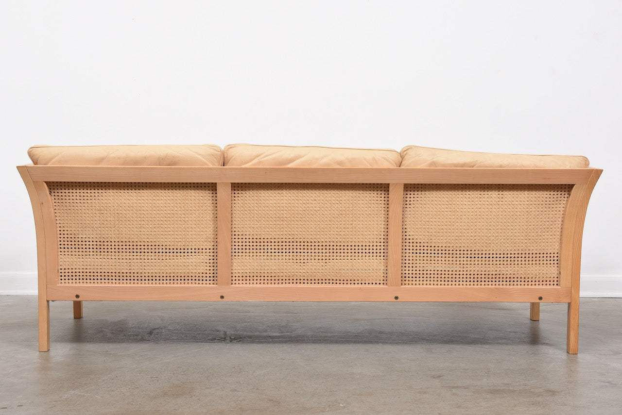 1960s leather + cane sofa by Arne Norell