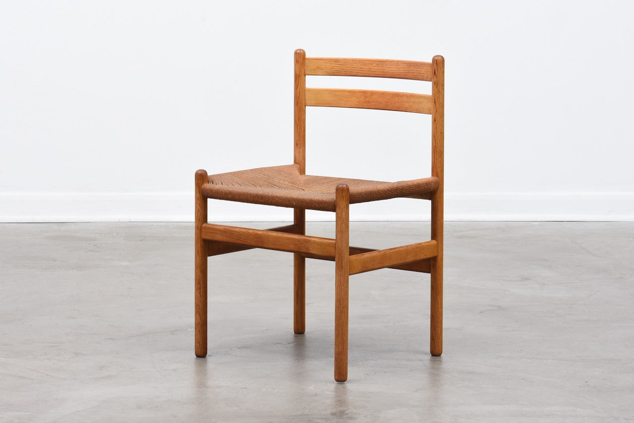 Two available: Oiled oak + cord chairs by Kurt Østervig
