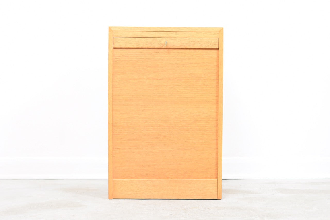 Low oak filing cabinet with tambour door