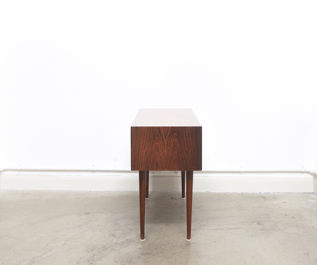 Low rosewood chest by Arne Vodder