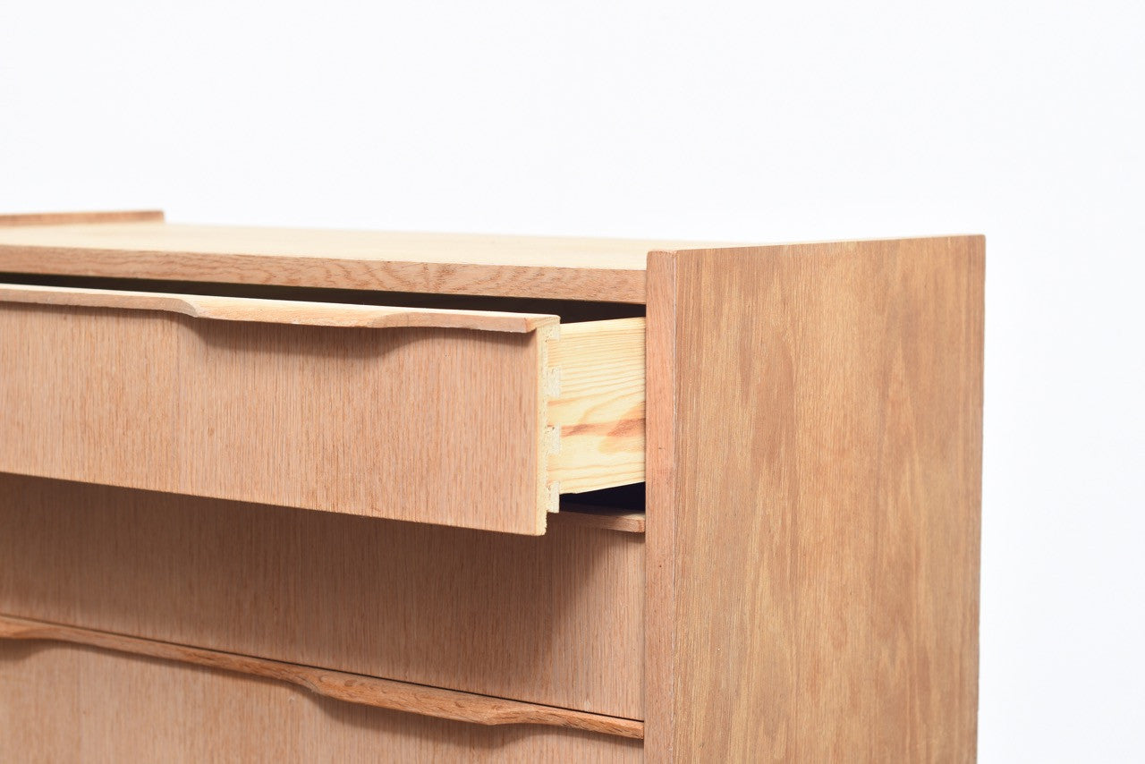 Short oak chest with lipped handles