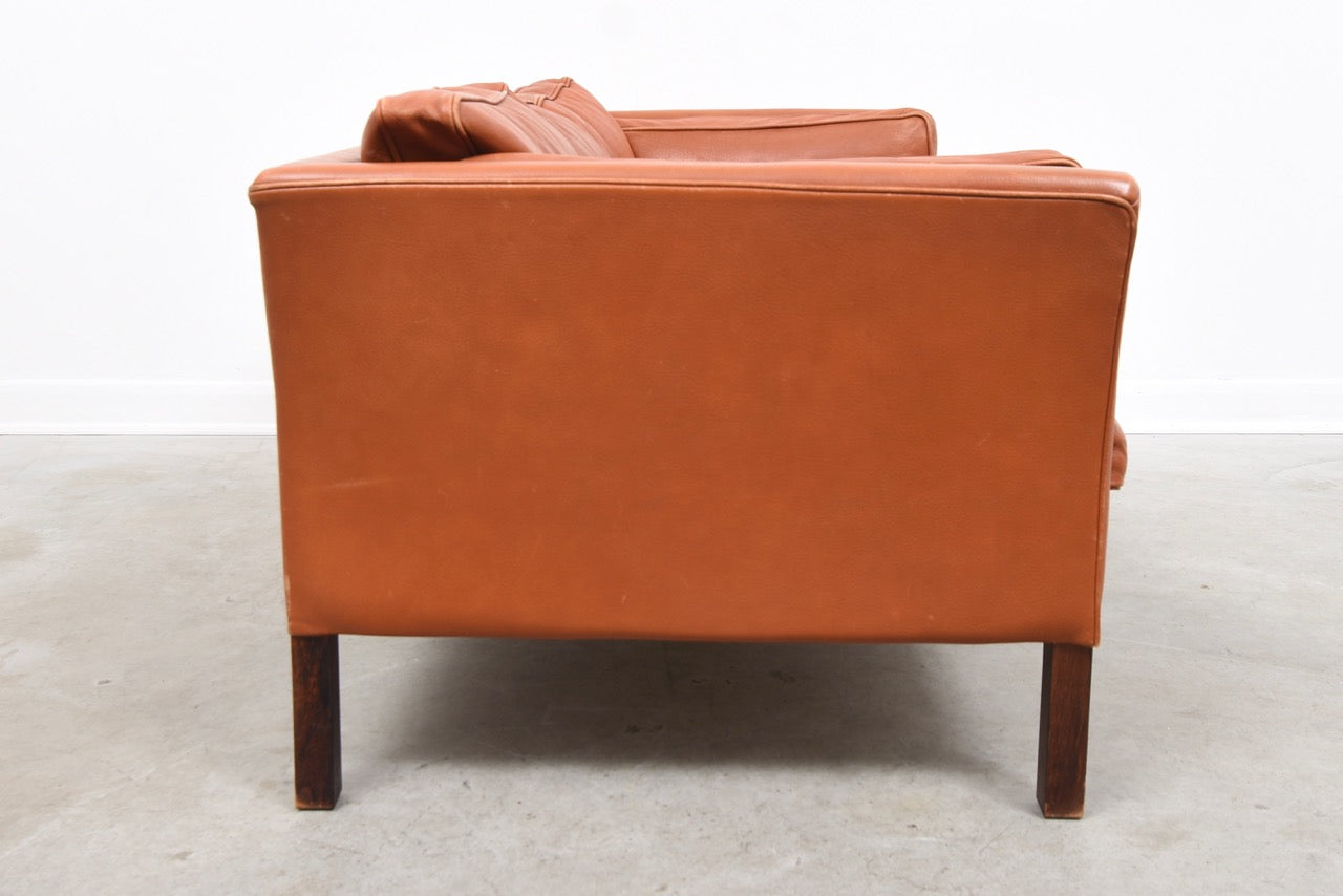 Vintage two seat leather sofa