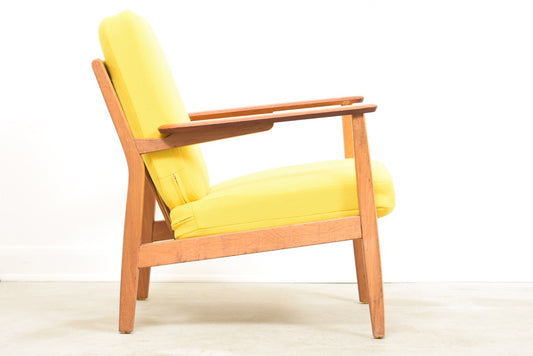 Low back lounger with teak arms + oak frame