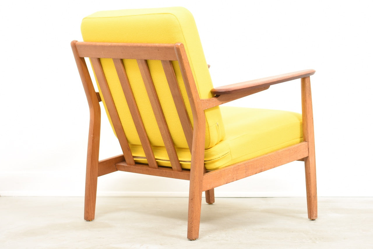 Low back lounger with teak arms + oak frame