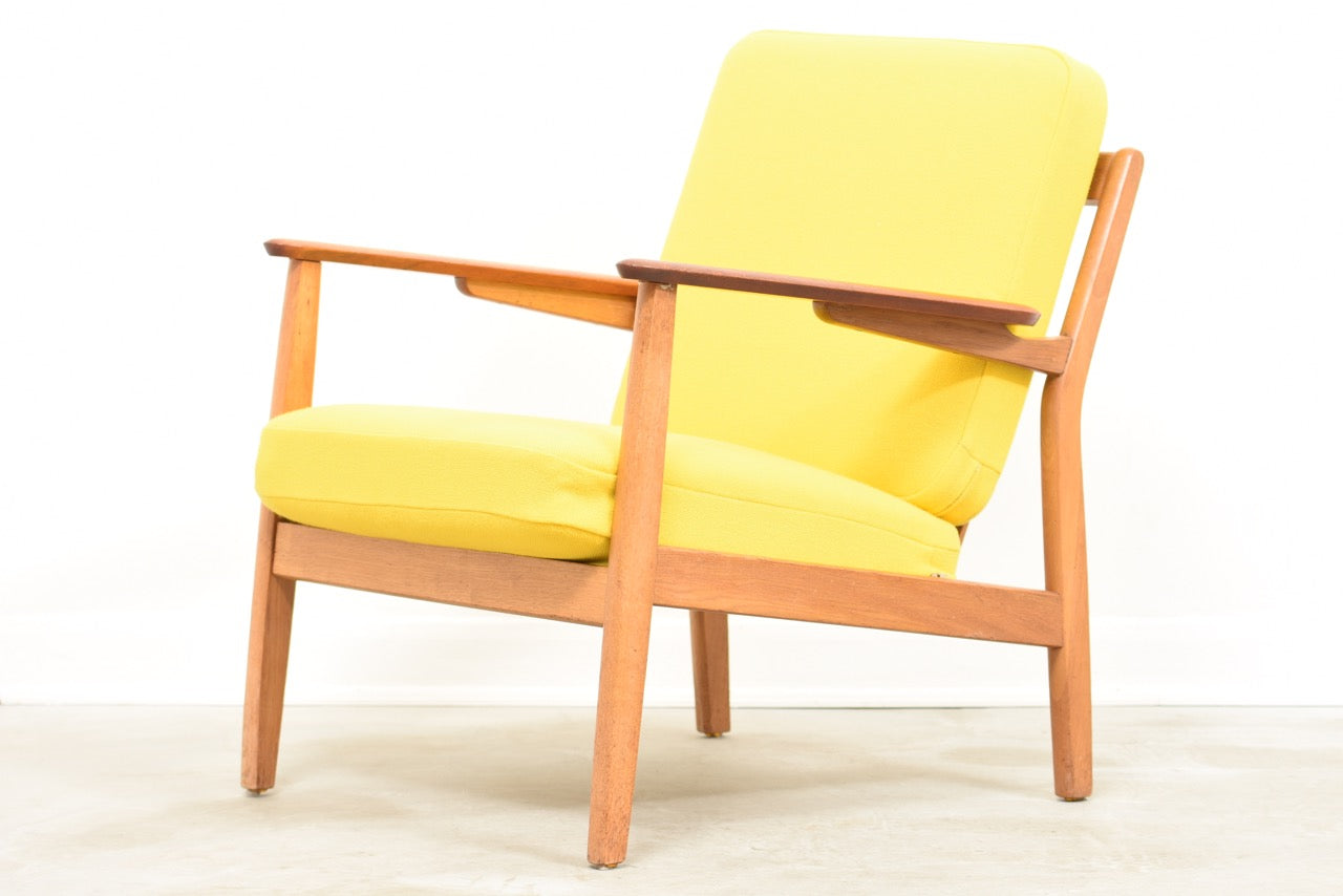 Low back lounger with teak arms + oak frame