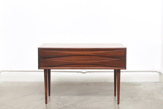 Low rosewood chest by Arne Vodder