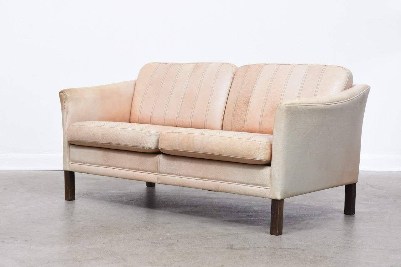 Vintage two seat tan leather sofa
