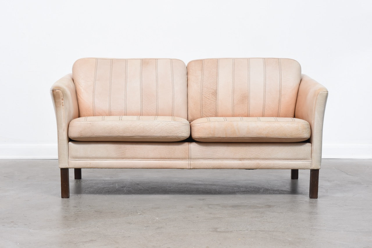 Vintage two seat tan leather sofa