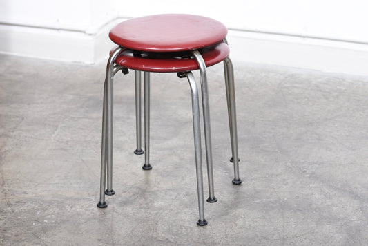 Two available: 1950s steel + vinyl stacking stools