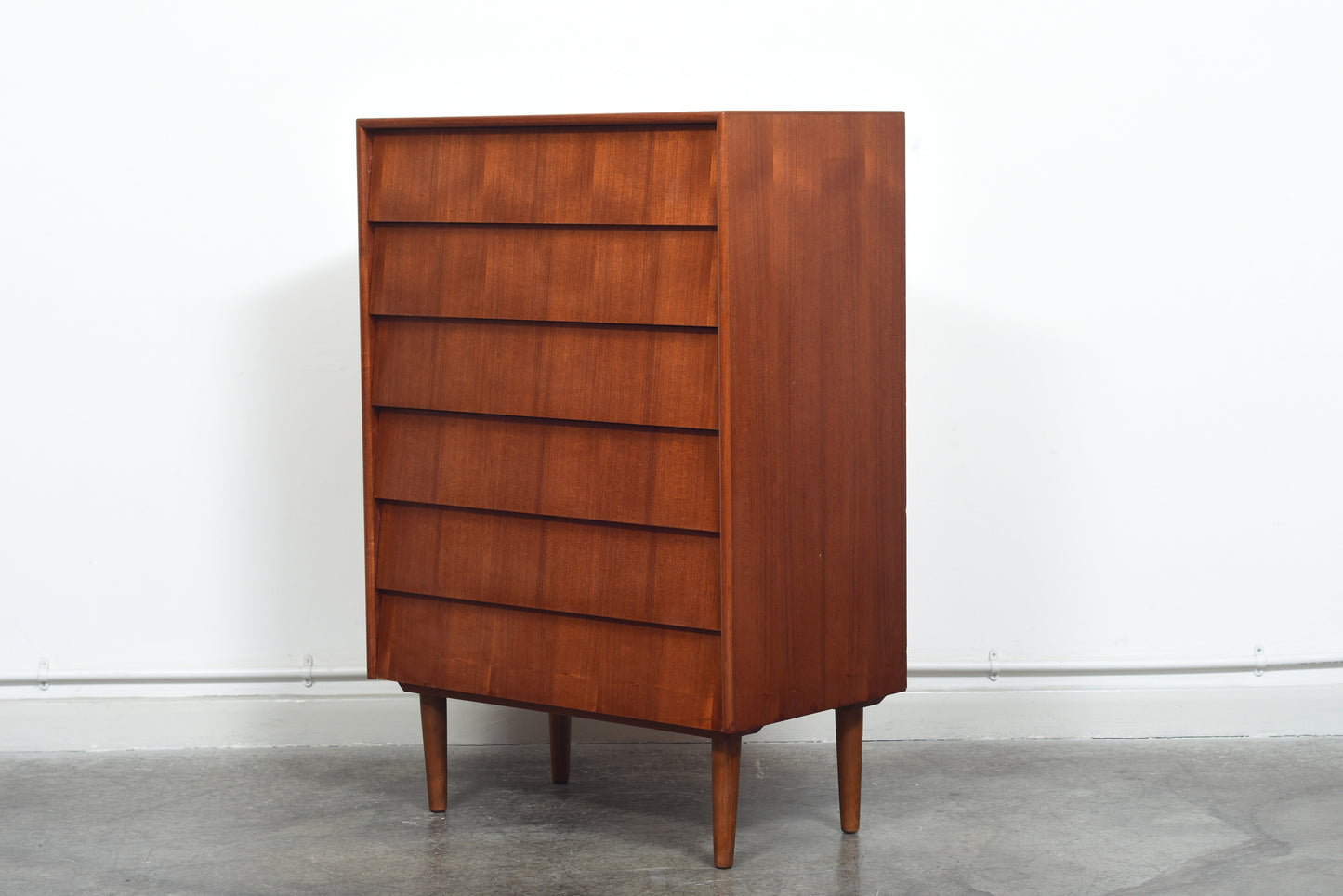 Chest of six angled drawers in teak