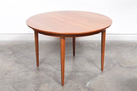 Extending circular dining table by Farstrup