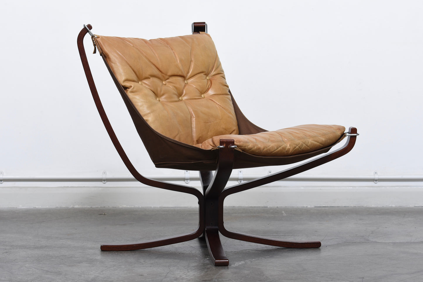 Two available: Falcon chairs by Sigurd Ressel