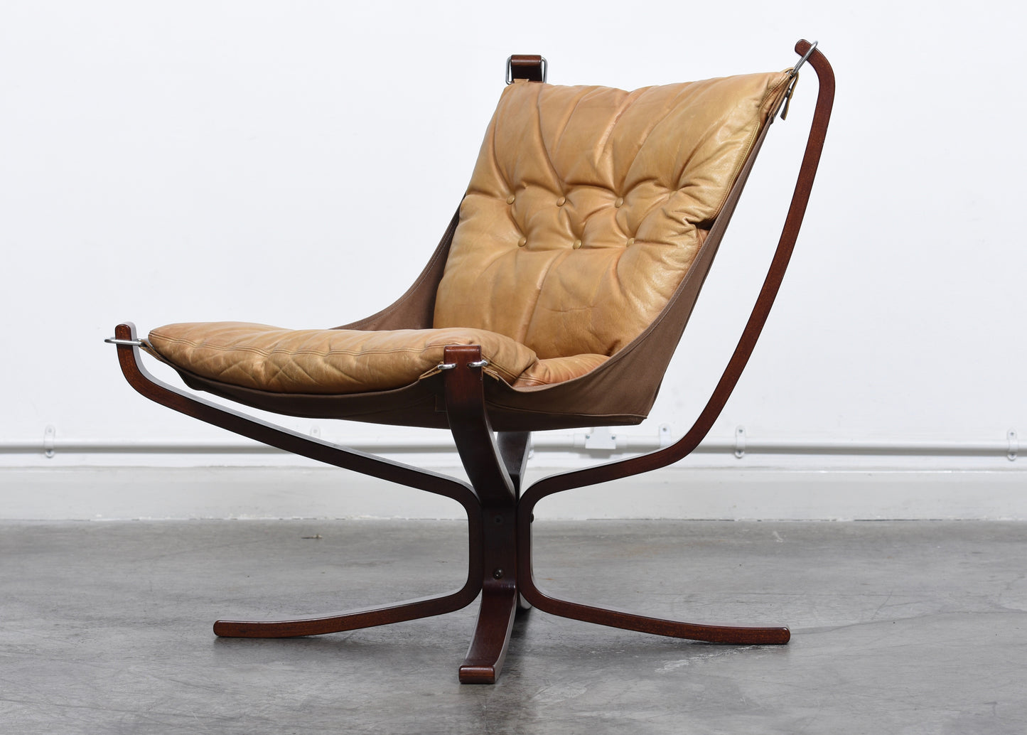 Two available: Falcon chairs by Sigurd Ressel