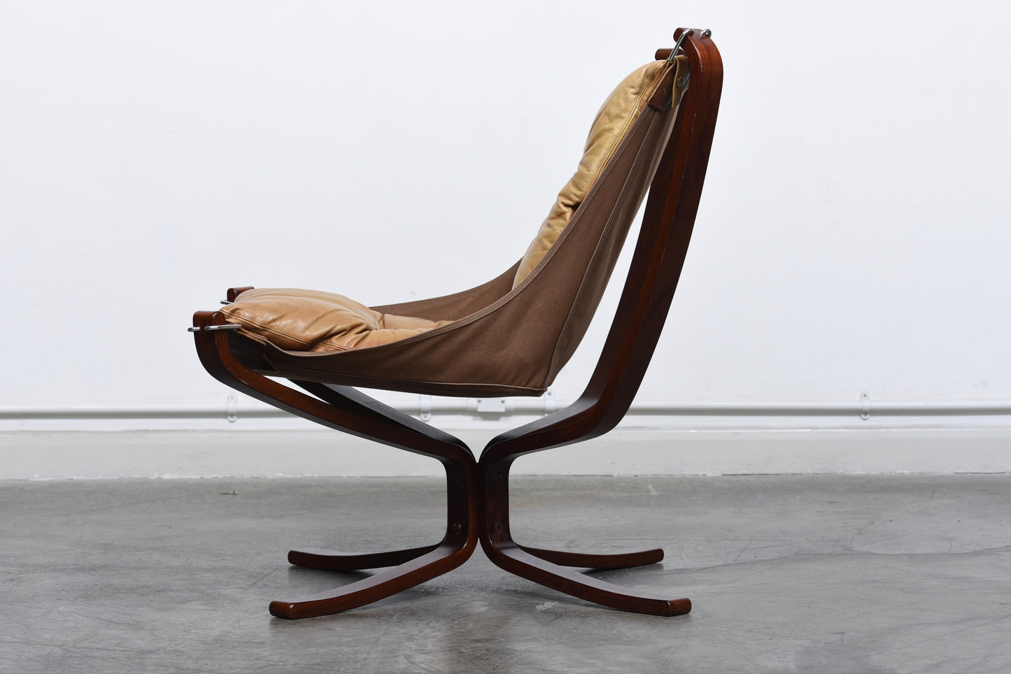 Two available: Falcon chairs by Sigurd Ressel