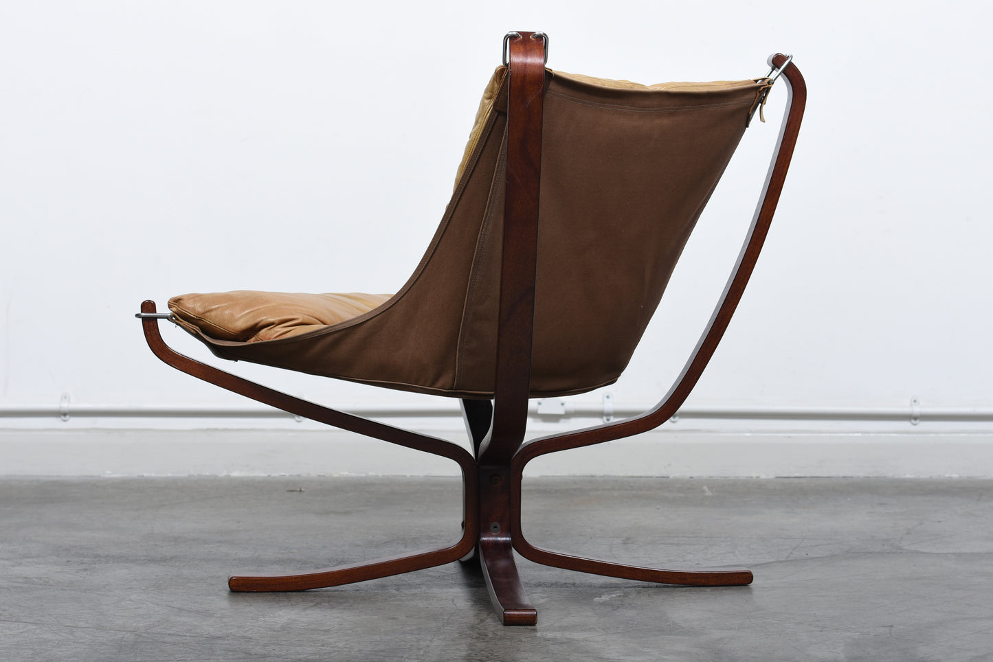 Two available: Falcon chairs by Sigurd Ressel