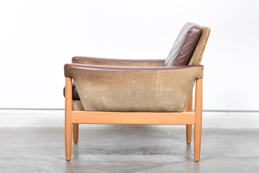 Suede, leather + oak lounger by Kurt Østervig