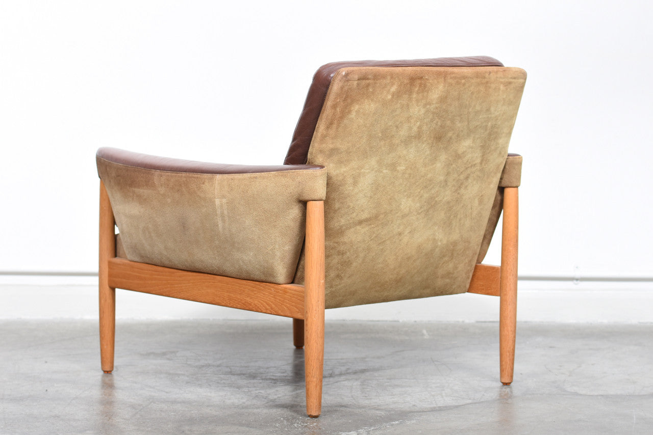 Suede, leather + oak lounger by Kurt Østervig