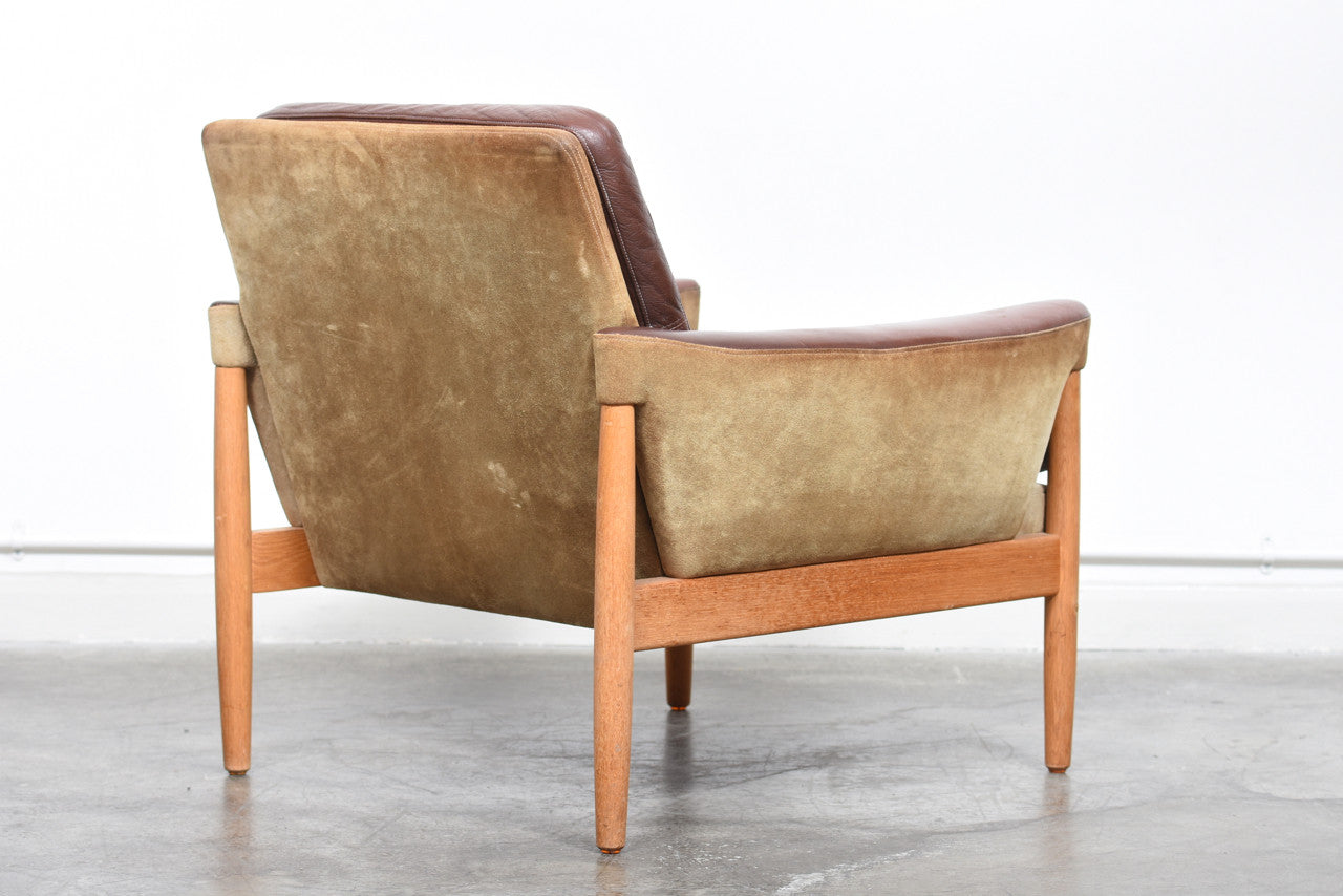 Suede, leather + oak lounger by Kurt Østervig