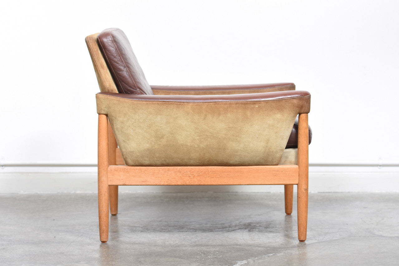 Suede, leather + oak lounger by Kurt Østervig